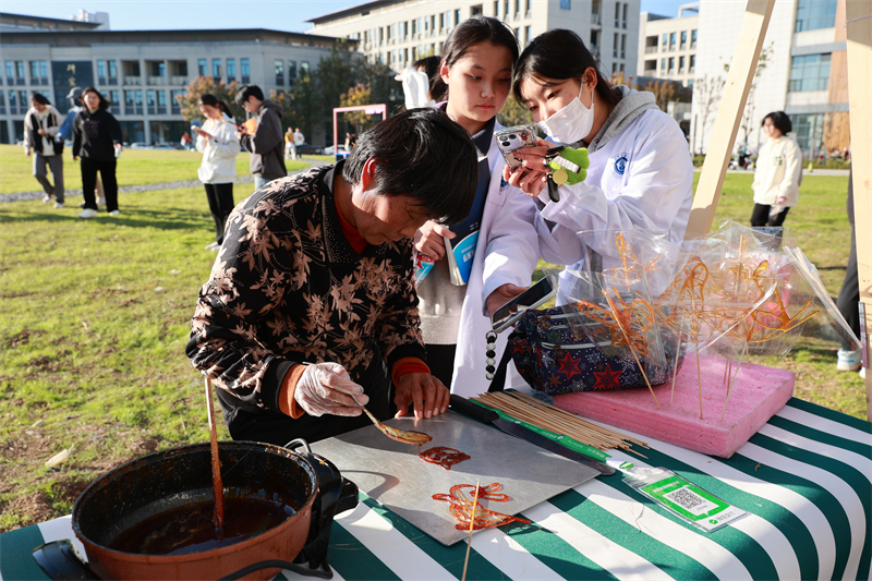 7.糖画.JPG 7.糖画.JPG